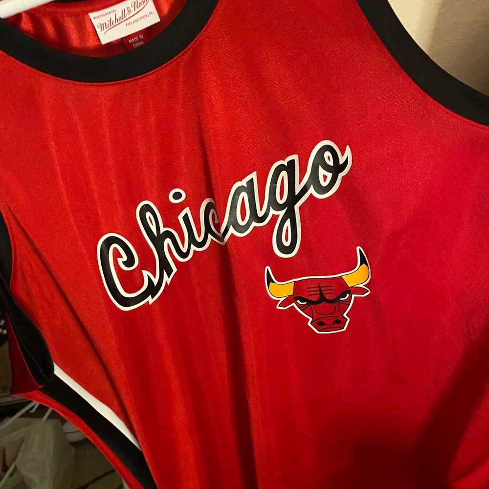 Never been worn Mitchell n Ness Bulls